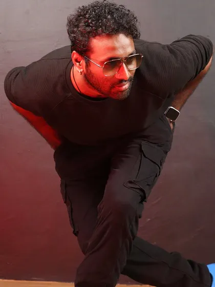 Another angle of our choreographer's signature pose, highlighting the intensity and focus we bring to our dance.