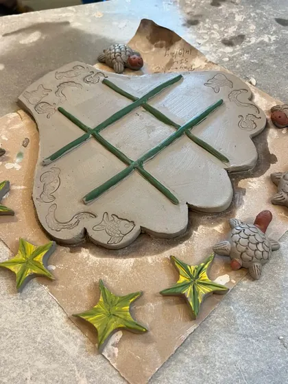 Who says you can't play with your pottery? Our Tic-Tac-Toe workshop is a fun, creative session where you can design and make your very own playable art.