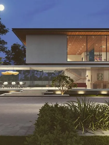 This 3D visualization captures a modern clubhouse design at night, where extensive glass walls blur the line between the interior and the surrounding landscape. The strategic exterior lighting highlights both the architectural form and the carefully selected plantings, creating an inviting and sophisticated community hub.