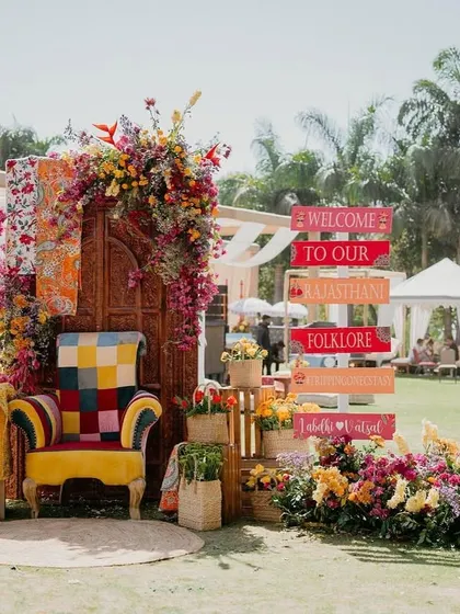We love creating spaces that are bursting with personality. This vibrant photo booth for a Rajasthani-themed Mehendi was all about color, texture, and joy, designed to be the perfect spot for making memories.