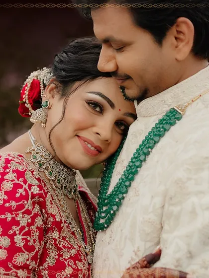 An intimate and loving portrait of the couple. The bride's soft, radiant makeup allows her natural beauty and emotions to be the focus.