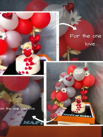 A teddy-themed cake and balloons form our Valentine's celebration gift, with the personal theme carried through the presentation.