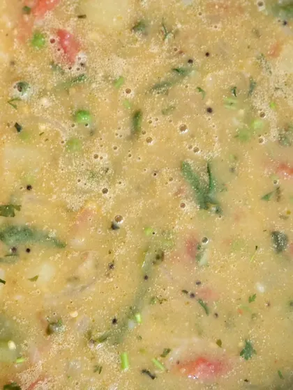 A close-up of a wholesome mixed vegetable and lentil curry.