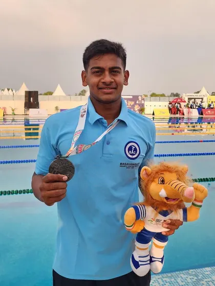 Swaroop Danuche with his relay silver medal.