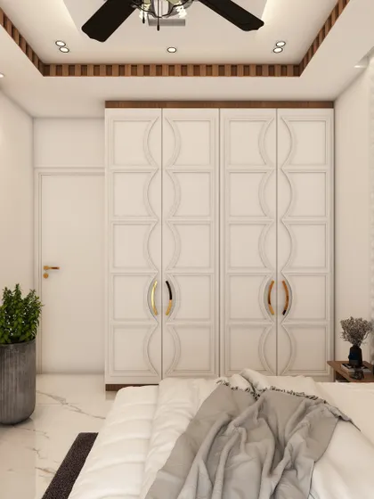 A view of the beautifully crafted wardrobe doors with a unique curved pattern, showcasing our ability to create custom, statement furniture pieces.