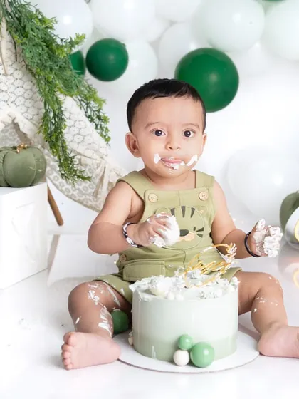 Look at that happy, messy face! This is the aftermath of a successful cake smash, and it's pure, unscripted joy. These are the moments you'll want to remember forever.