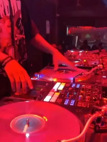 A close up of my hands on the vinyl during a "Back 2 Skool Jam". I was spinning a mix of old school hip hop and R&B, and using real records is key to getting that authentic, warm sound.