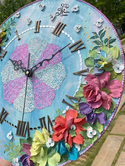 A different perspective of the 12-inch custom clock, showing how the flowers are arranged asymmetrically to create a more dynamic and modern feel.