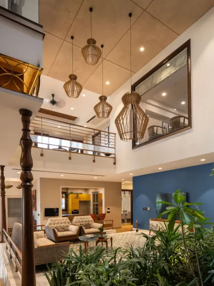 The central courtyard of the Ashraya Residence connects the home both horizontally and vertically. It links semi-private spaces like the terrace garden and dining area, while a green patch brings life and comfort to the heart of the home.