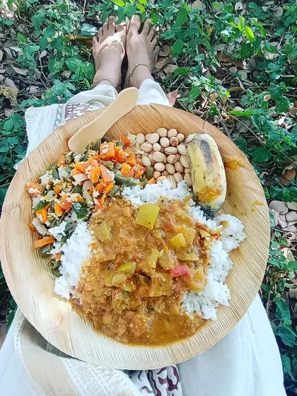 A simple, nourishing meal of rice, vegetables, and legumes served on a leaf plate at the Isha Yoga Center. Eating in this way, close to nature, makes you more sensitive to the food you consume and how it affects your system. It is a practice in mindfulness itself.