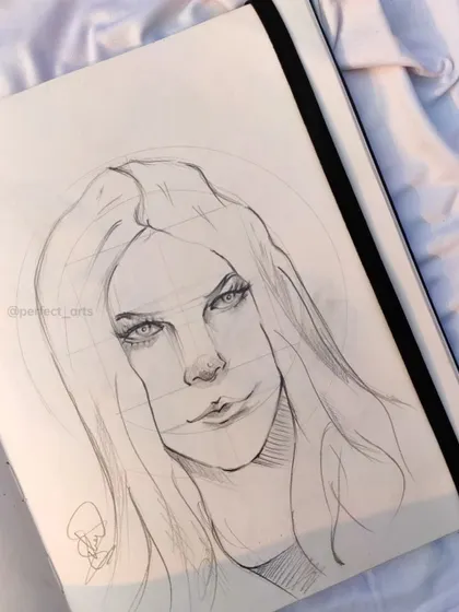 A page from my doodle diary. This is where I practice different face structures and styles without the pressure of creating a finished piece.
