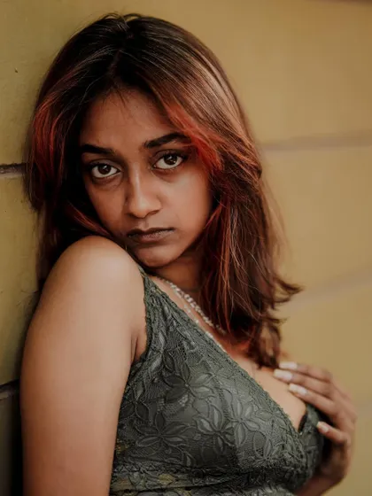 This is a powerful, direct portrait with a strong emotional current. The lighting and close crop make it incredibly engaging.