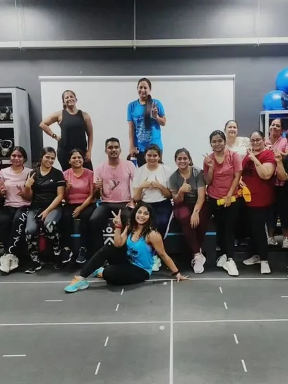 The heart and soul of my classes. Each photo captures a unique moment with my incredible community after a sweaty, joyful session. This is our shared victory lap.