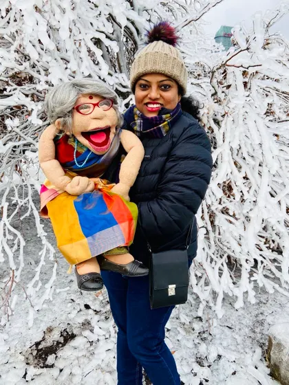 'Kannadada Ajji in Canada!' A throwback picture of Ajji enjoying the snow during one of our international trips. She brings her warmth everywhere she goes.