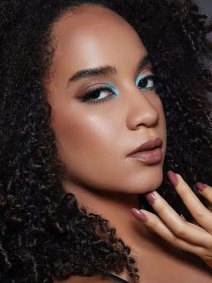 A pop of turquoise liner paired with a sharp wing. This look from our Bangalore portfolio shoot demonstrates how to use color for a striking yet clean effect.