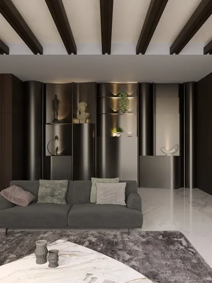A different perspective of the same room, showing the curved wall with integrated shelving. This feature adds architectural interest and provides a unique display space for decorative objects.