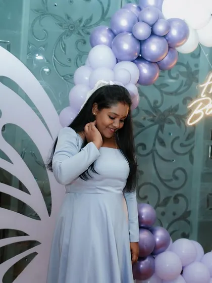 The client looking lovely in her custom-made powder blue dress.
