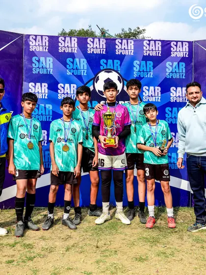 The U13 runners-up team from Global Sports Coaching, proud of their hard-fought tournament journey.