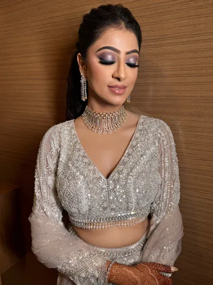 A close-up of this gorgeous purple smokey eye. The colors are blended to perfection, creating a look that is both glamorous and sophisticated.