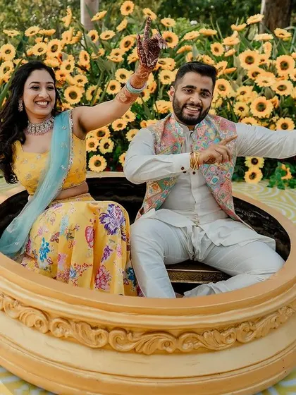 A collection of fun and vibrant moments from a sun-drenched Haldi. From playful entries to candid portraits, we capture the complete story of this joyous celebration.