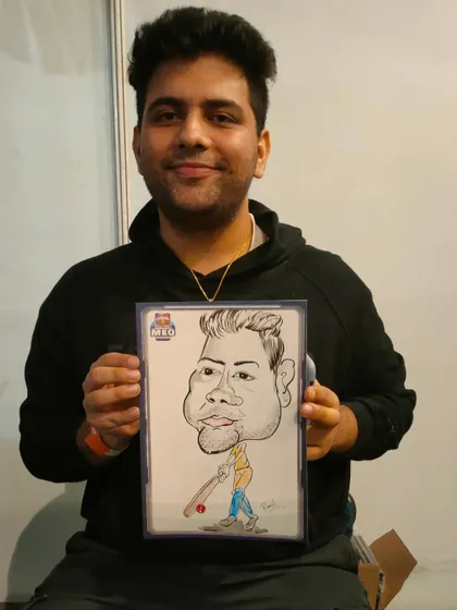 A framed caricature for a gamer at a Redbull MEO (Mobile Esports Open) event, combining his passion with my art.
