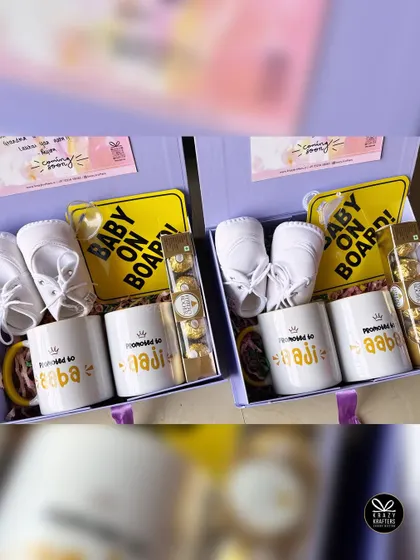 Two complete pregnancy announcement hampers, beautifully arranged and ready to bring so much happiness to the grandparents-to-be.