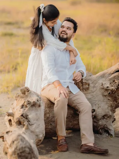 A sweet and spontaneous moment from behind. These unscripted hugs and laughs are what make a pre-wedding session so special.