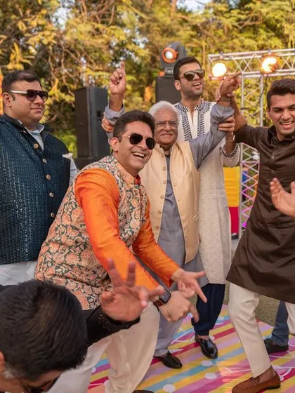 The guests dancing with abandon, a key ingredient for a memorable Mehendi celebration.