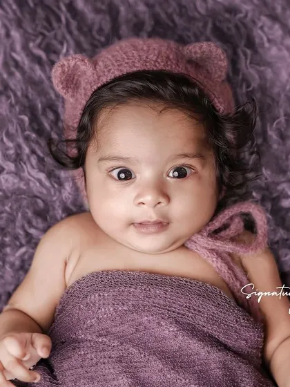 A duplicate of image 186, a curious four-month-old baby.