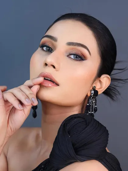 All decked up in details. For this look, we created a soft, smudged liner and a wet-hair look for a clean, modern, and high-fashion vibe.
