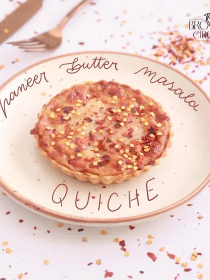 A delightful twist on a classic. Our Paneer Butter Masala Quiche brings the beloved Indian flavor into a flaky, buttery French pastry.