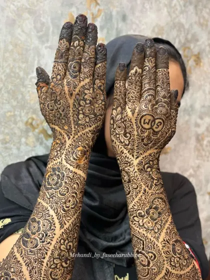 Another angle of this unique engagement henna, showing the delicate vine work that covers both arms.