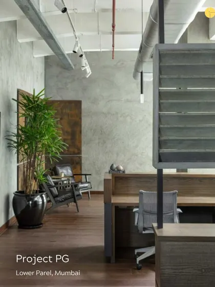 For 'Project PG' in Lower Parel, we embraced the building's industrial heritage. The design features exposed ceilings and concrete walls, balanced by warm wooden floors and partitions, creating a workspace that is both raw and refined.