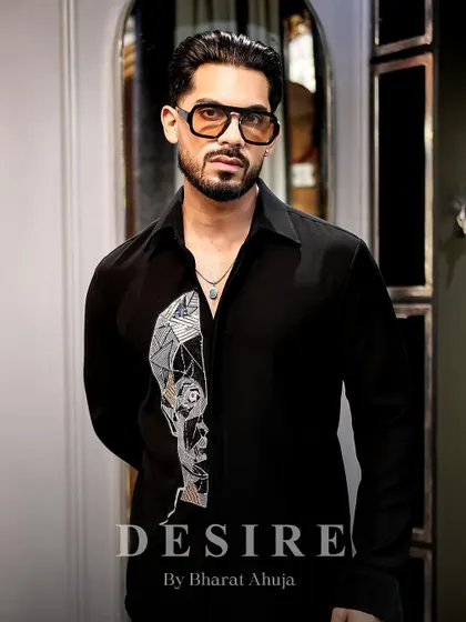 A confident portrait in the abstract face shirt. This is a piece for the man who dares to stand out.