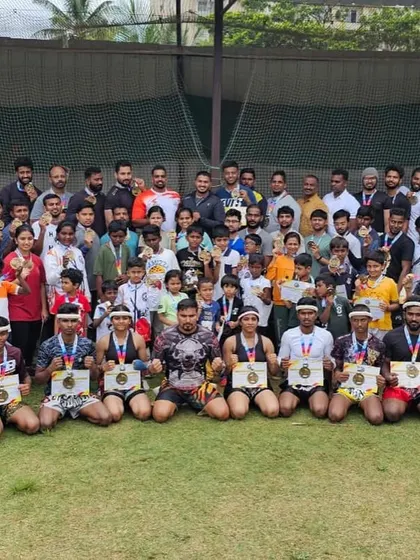 A massive group photo from our outdoor Muay Thai training camp. We take our training beyond the gym walls to build well rounded athletes.