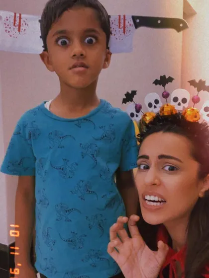 Making spooky faces for our spooky baking session. The fun and silliness are just as important as the baking itself.