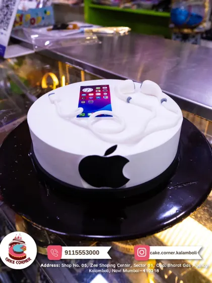 An Apple iPhone cake with the iconic logo and an edible phone screen with apps. A sleek and modern design for any tech lover.