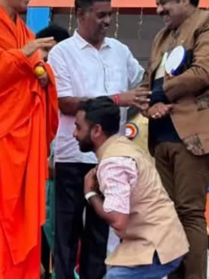 A candid moment of seeking blessings from a Swamiji during the Bright Academy event. Humility and respect are very important to me.