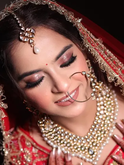 A close-up of one of my happy brides, whose kind words are a testament to the magic we create together. Her glowing skin and sparkling eyes reflect her happiness.