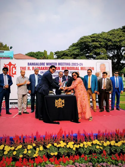 The R. Ramakrishnan Memorial Million trophy is presented to the winning owner.