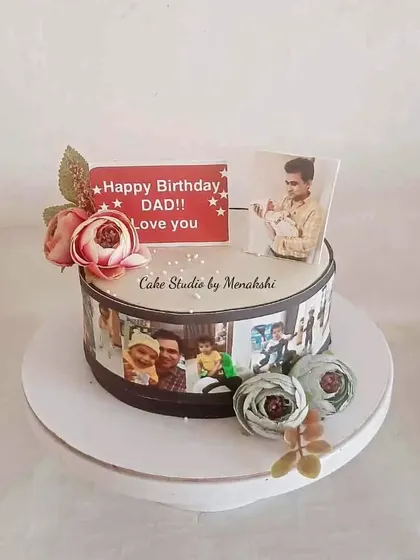 A photo reel cake is a wonderful way to celebrate a dad's birthday. This design is wrapped in memories and topped with a personal message and delicate flowers.