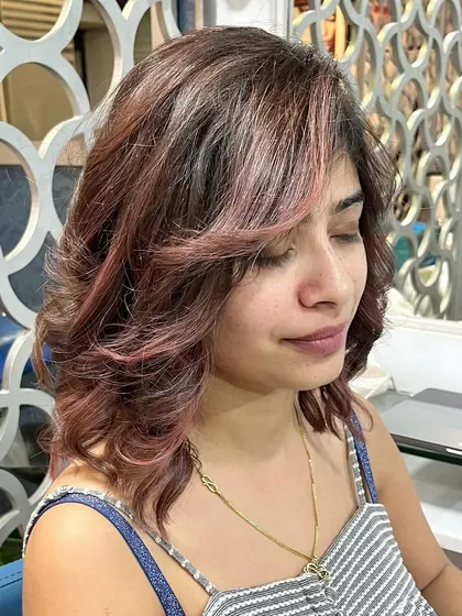 A close-up of the soft rose gold balayage.