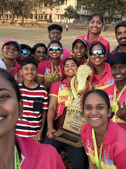 A team selfie with the trophy. We are more than just teammates, we are a close-knit family that shares every moment of triumph.