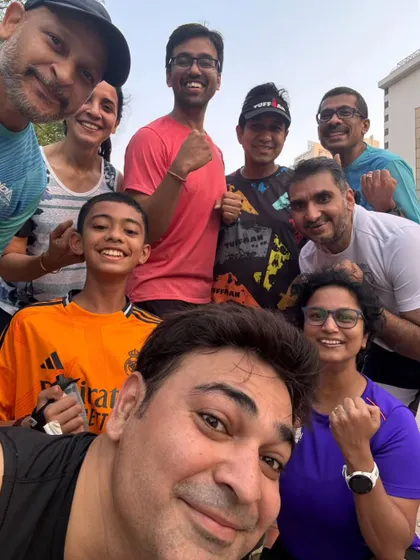 A selfie capturing the joy and camaraderie of a group run. We train hard, but we also have fun.