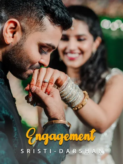 A beautiful poster-style image capturing the groom kissing the bride's hand, a perfect summary of their engagement.