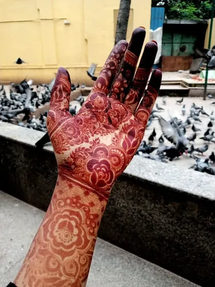 Another angle showing the beautiful floral stain on the palm and wrist.