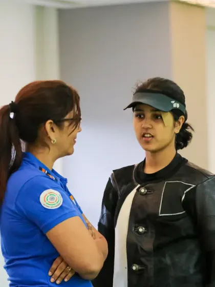 An intense moment of coaching between Olympian Suma Shirur and a national-level shooter at our specialized camp.