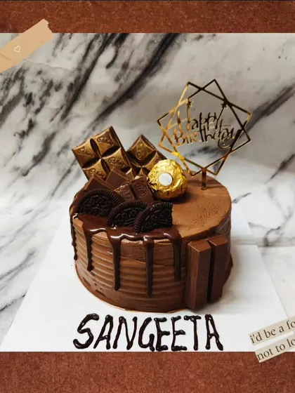 A classic for a reason, my Ferrero Rocher cake is pure indulgence. It has layers of chocolate sponge, Nutella mousse, and crunchy bits, topped with more chocolate and Ferrero Rochers.