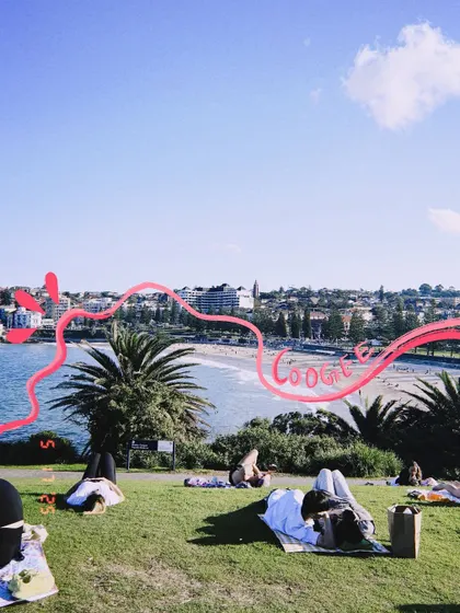 Chilling at Coogee Beach. The red doodle traces the beautiful coastline in this scenic shot.