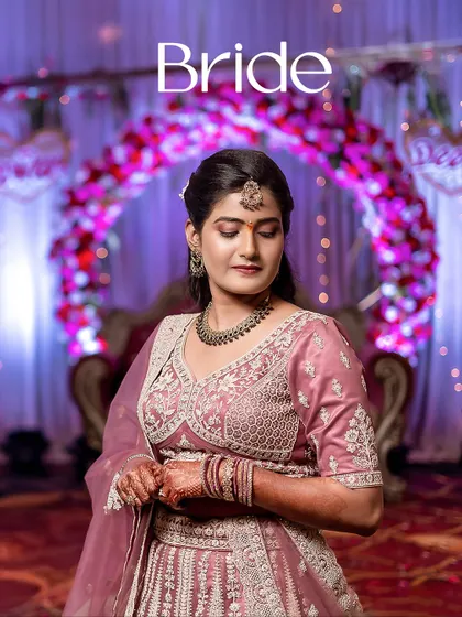 A candid and contemplative bridal portrait. This quiet moment before the festivities is a beautiful memory to capture.